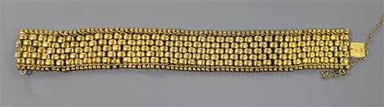 A 15ct gold brick link bracelet, 15.5cm.